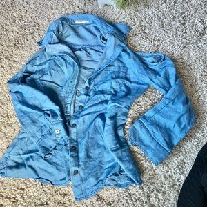Unique shoulder hole denim like light blue jacket with buttons.